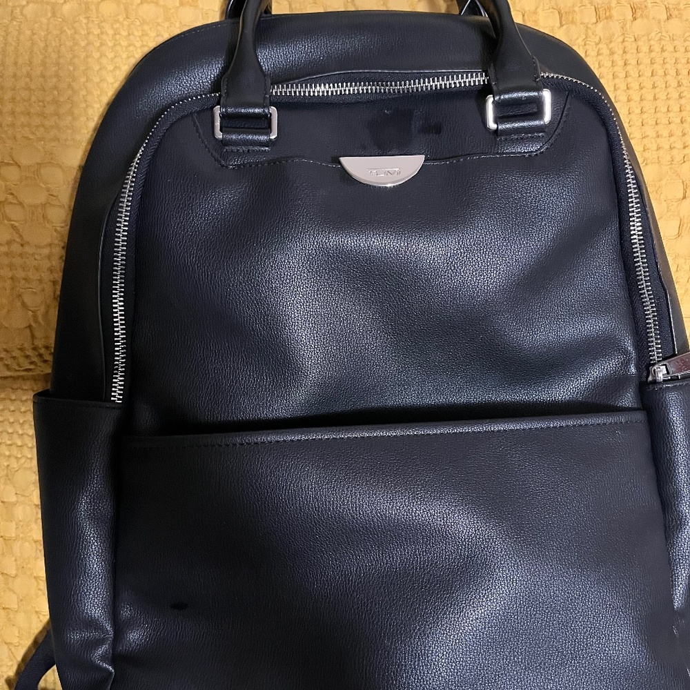 Tumi black leather style backpack- women